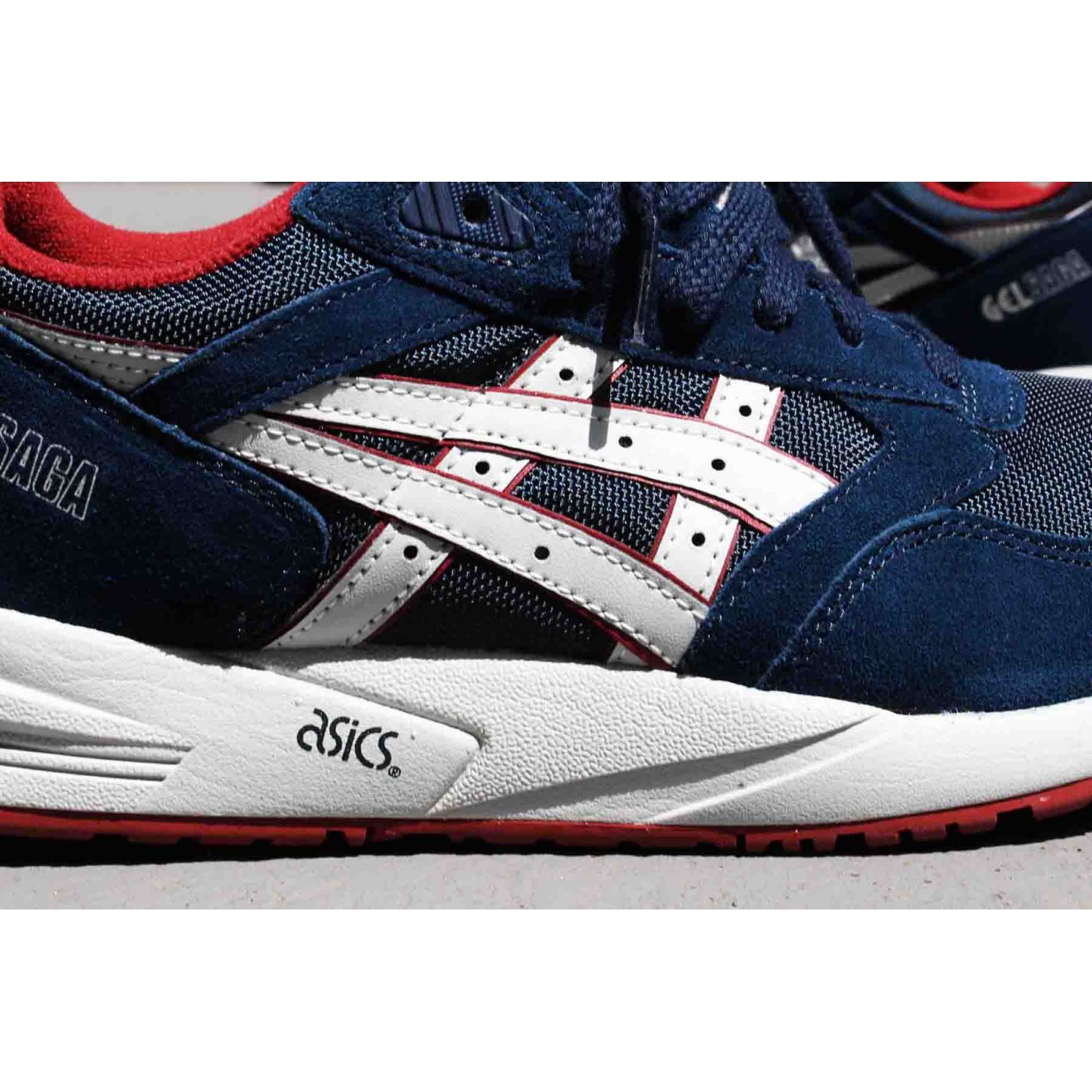 navy asics trainers
